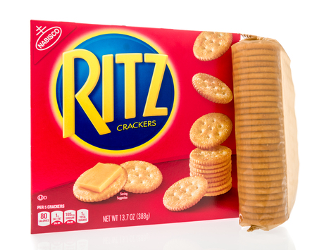 Winneconne, WI - 4 November 2018: A box of Ritz crackers with a tube of crackers next to it on an isolated background.のeditorial素材