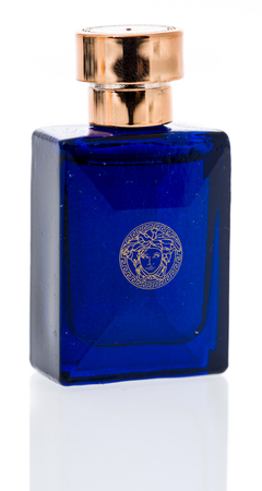Winneconne, WI - 1 December 2018: A bottle of Versace Dylan blue pour homme cologne for men on an isolated background. Winneconne, WI - 1 December 2018: A bottle of Versace Dylan blue pour homme cologne for men on an isolated background.