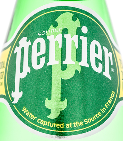 Winneconne, WI - 30 December 2018: A close up image of Perrier water bottle on an isolated background.のeditorial素材