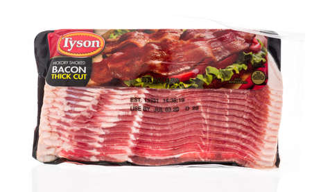 Winneconne,  WI - 26 April 2020:  A package of Tyson bacon on an isolated background.のeditorial素材