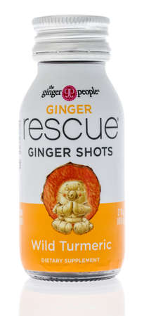 Winneconne,  WI - 26 April 2020:  A package of The ginger people ginger rescue ginger shots wild turmeric drink on an isolated backgroundのeditorial素材