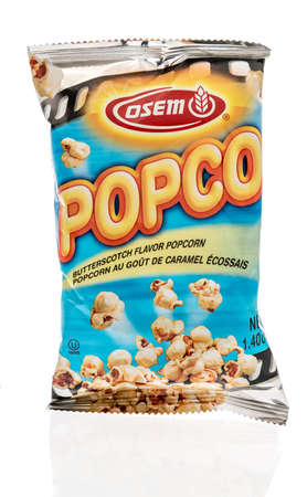 Winneconne,  WI - 19 July 2020: A package of Osem popco popcorn butterscotch flavor on an isolated backgroundのeditorial素材