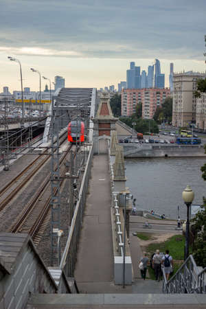 Moscow, Russia, August 12, 2018 - City transport highways. Railway, highway, river. Moscow River, Andreevsky Bridgeのeditorial素材