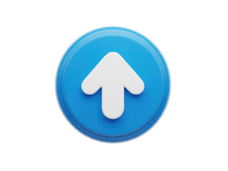 The image features a blue circular button with a white up arrow in the center. The button has a smooth, glossy finish and is set against a plain white background. The arrow is simple and straightforward, pointing upwards, suggesting an action or direction. The overall design is minimalistic and clean, making the button's purpose clear and easy to understand.の素材