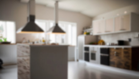 Blurred image of modern kitchen interior for background uses. Blurred image.の写真素材