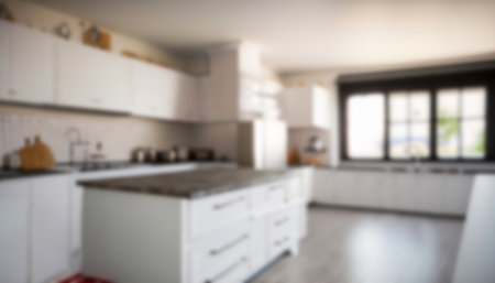 Blurred image of modern kitchen interior for background uses. Blurred background.の写真素材
