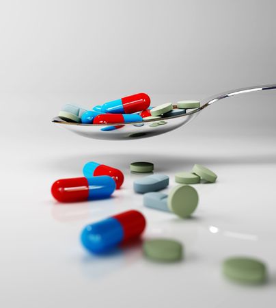 pills in spoonの写真素材