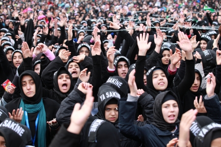 Istanbul, Turkey - November 24, 2012 : Shiite mourners offer afternoon prayer during Chehlum Procession of Hazrat Imam Hussain (AS) on November 24, 2012, in Istanbul,Turkey.のeditorial素材