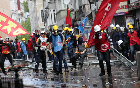ISTANBUL, TURKEY-MAY 1  Turkish police fired water cannon and tear gas to prevent protesters from defying a ban on May Day rallies and reaching Taksim Square on May 1, 2014 in Istanbul, Turkey のeditorial素材