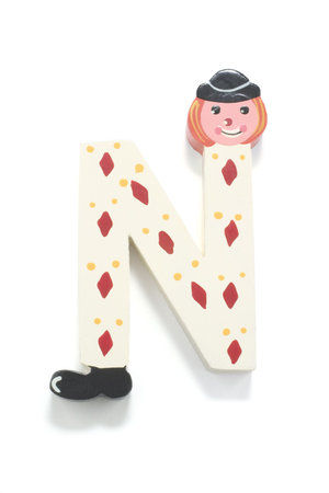 Toy Alphabet on white background with shadowの写真素材