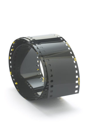 A strip of film on white background with shadowの写真素材