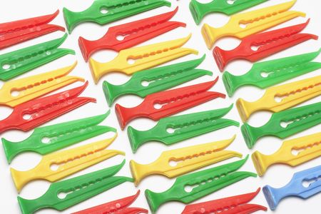 Clothes Pegs on White Backgroundの写真素材