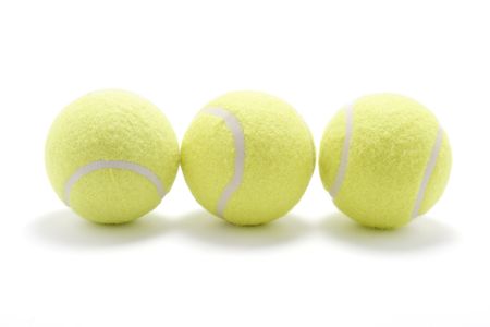 Tennis Balls on White Backgroundの写真素材