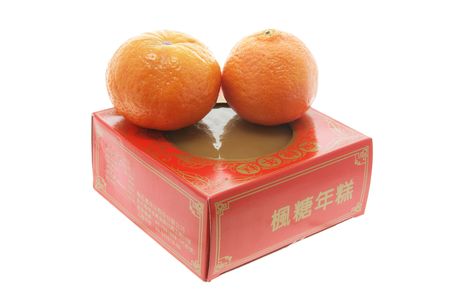 Mandarins on Chinese New Year Cakeの写真素材
