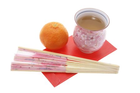 Mandarin, Teacup and Red Packetの写真素材