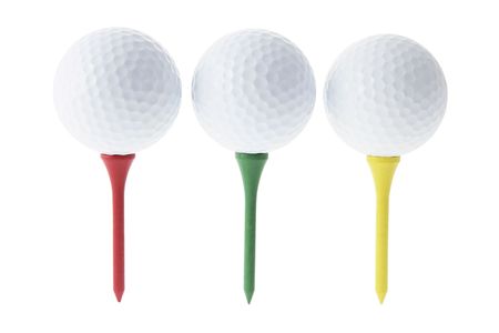 Golf Balls on Tees on White Backgroundの写真素材