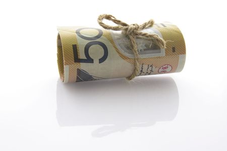 Roll of Notes Tied with Stringの写真素材