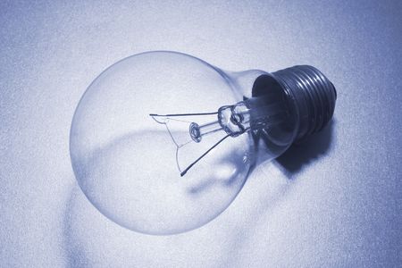 Light Bulb on Seamless Background in Blue toneの写真素材