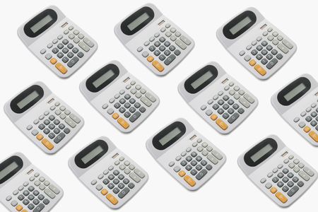 Calculators on Seamless Plain Backgroundの写真素材