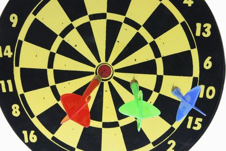 Close Up of Darts on Dart Board