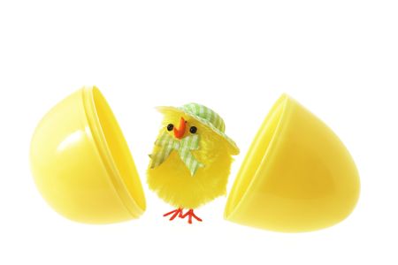 Toy Easter Chick and Egg Shells on White Background
