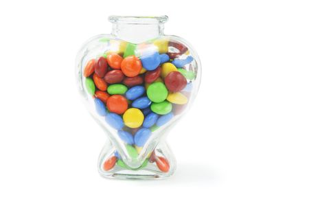 Chocolate Lollies in Vase on White Backgroundの写真素材