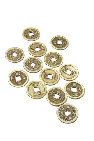 Ancient Chinese Coins on White Backgroundの写真素材