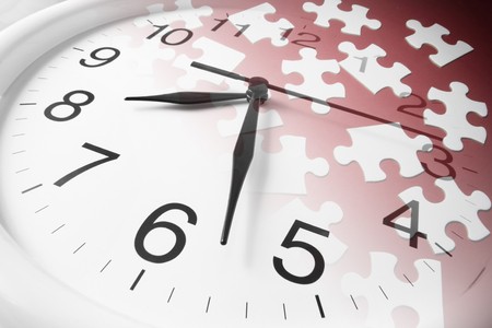 Composite of Jigsaw Puzzles and Clock