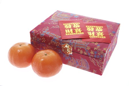 Mandarins and Red Packets on Isolated White Backgroundの写真素材