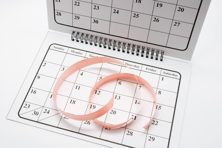 A Strip of Ribbon on Calendar on Seamless Backgroundの写真素材