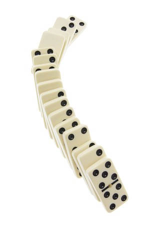 Row of Dominoes on White Backgroundの写真素材