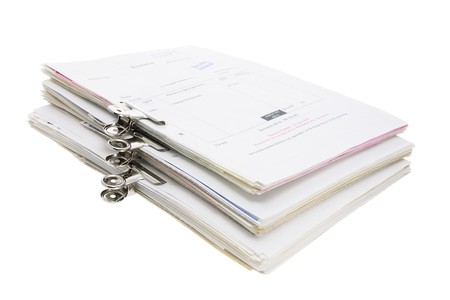 Stacks of Business Documents on White Backgroundの写真素材