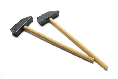 Wooden Hammers on Isolated White Background