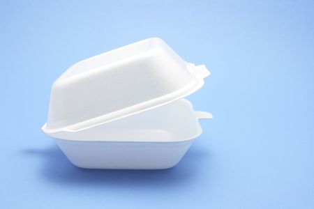 Polystyrene Food Box on Blue Backgroundの写真素材