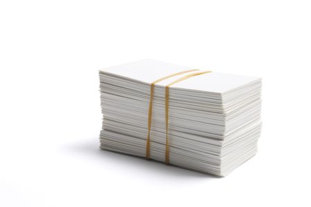 Stack of Blank Name Cards on White Backgroundの写真素材