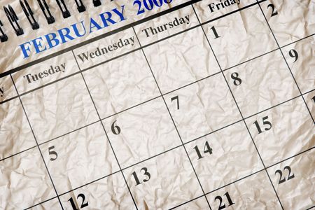 Close Up of Crumpled Calendar in Warm Toneの写真素材