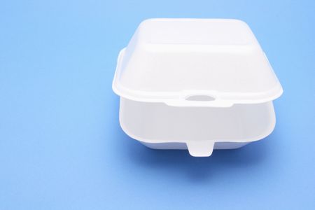 Polystyrene Food Box on Blue Backgroundの写真素材