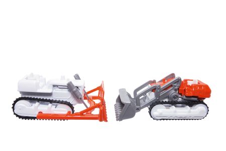 Miniature Toy Farm Vehicles on White Backgroundの写真素材