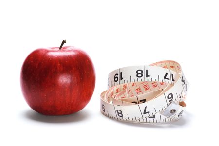 Apple and Tape Measure on White Backgroundの写真素材