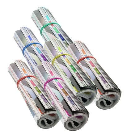 Rolled-up Magazines on White Backgroundの写真素材