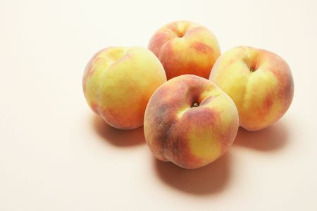Peaches on Seamless White Backgroundの写真素材