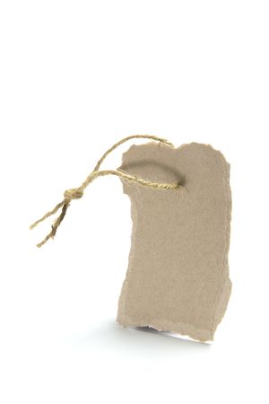 Torn Cardboard Tag on White Backgroundの写真素材