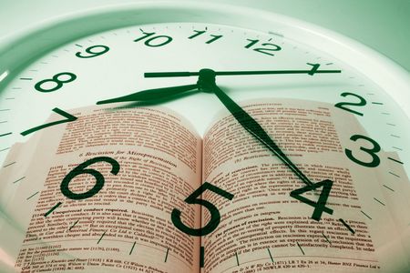 Composite of Wall Clock and Opened Bookの写真素材