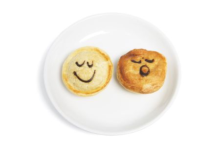 Mini Pies on Plate on white Backgroundの写真素材