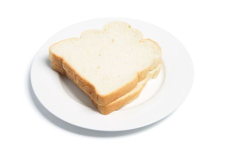 Sliced Bread on Plate on White Backgroundの写真素材