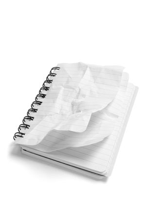 Notepad with Crumpled Pages on White Backgroundの写真素材