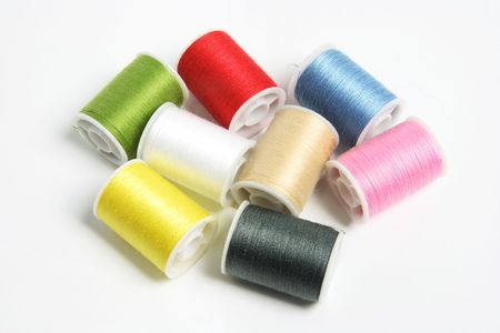 Spools of Thread on Seamless White  Background