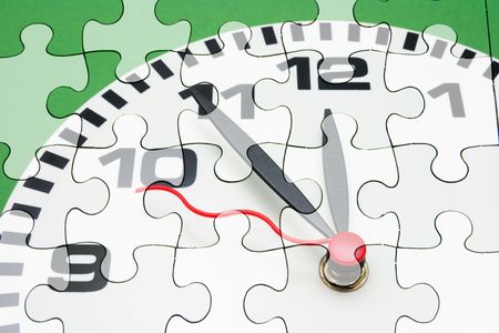 Composite of Clock Face and Jigsaw Puzzles