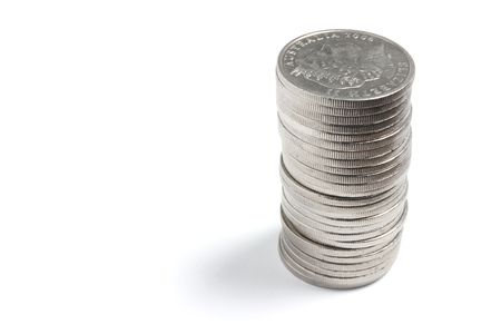Stack of Coins on White Backgroundの写真素材