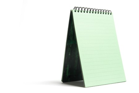 Green Notepad on White Backgroundの写真素材